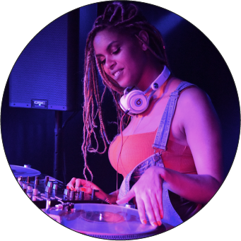 Image of a woman DJ'ing