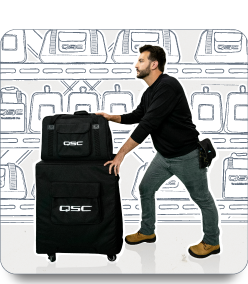Image of a man pushing QSC speakers